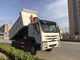 Sinotruk 6x4 10 βαρέων καθηκόντων φορτηγό απορρίψεων ροδών με την ανατροπή της πλατφόρμας σώματος