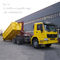 Φορτηγό απορριμάτων ρόλων βραχιόνων γάντζων SINOTRUK HOWO 6x4 για τα απορρίμματα σκουπιδιών αποβλήτων